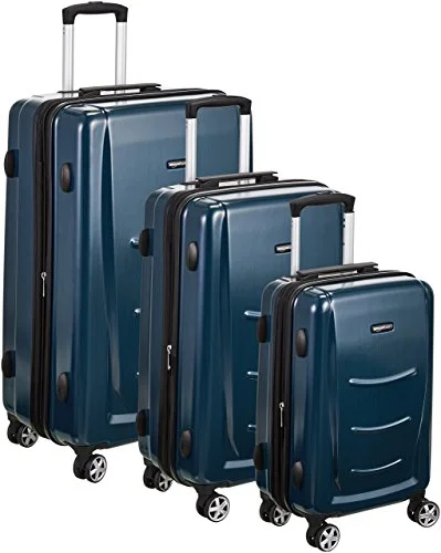 Luggage straps with buckle closures to secure overstuffed bagsAmazonbasics Hardshell Spinner Luggage - 3-Piece Set (20", 24", 28"), Navy Blue