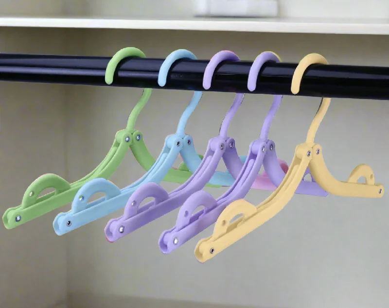 Luggage straps with buckle closures to secure overstuffed bagsFoldable Travel Hanger- $1.99