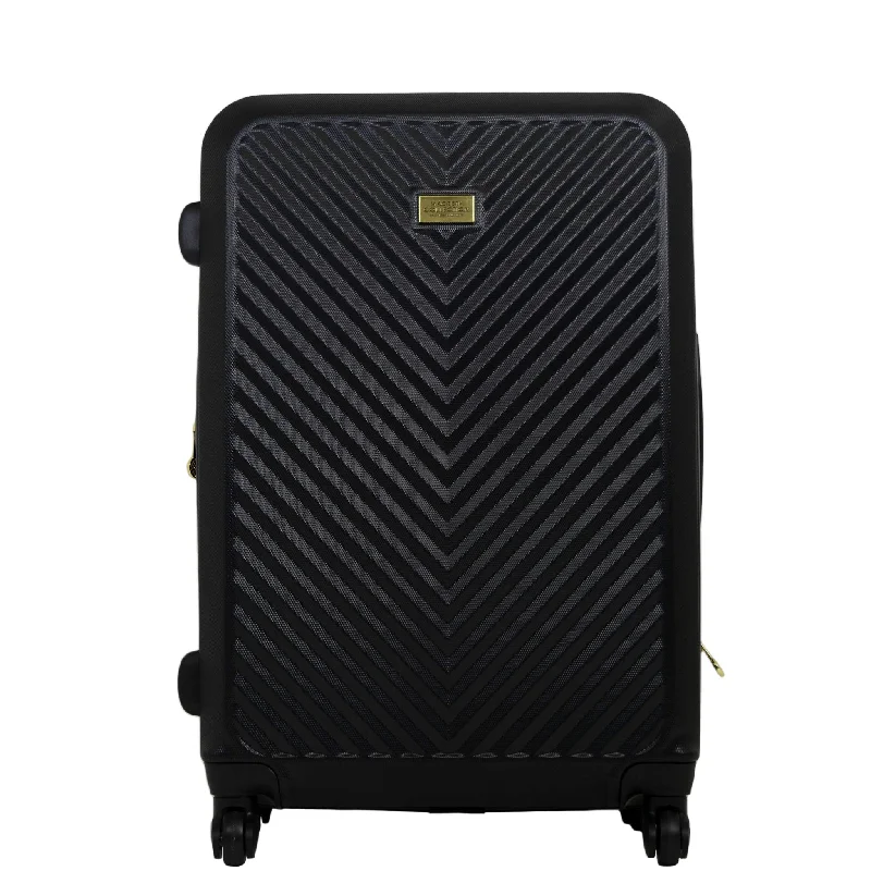TSA-approved combination locks for luggage security during international travelMacbeth Collection Women's Black Molded Quilt 27in Rolling Luggage