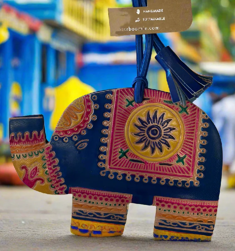 Waterproof luggage covers for protection against rain on outdoor tripsMatr Boomie Elephant 🐘 Luggage Tag- $19.99