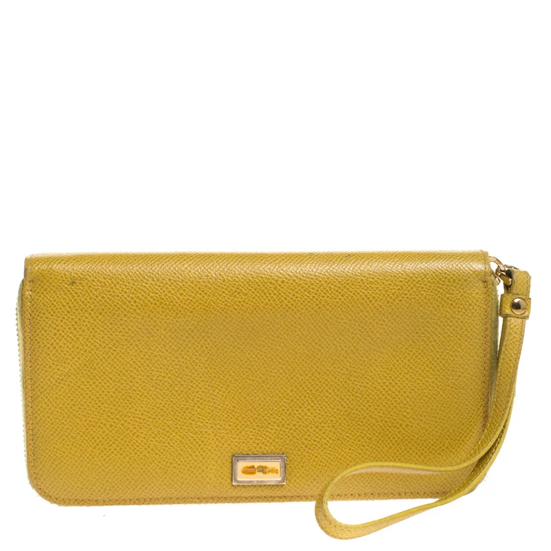 Women's money clip with a faux fur trimDolce & Gabbana Paglia Yellow Leather Strappy Zip Around Wallet.. Women's money clip with a faux fur trimDolce & Gabbana Paglia Yellow Leather Strappy Zip Around Wallet..