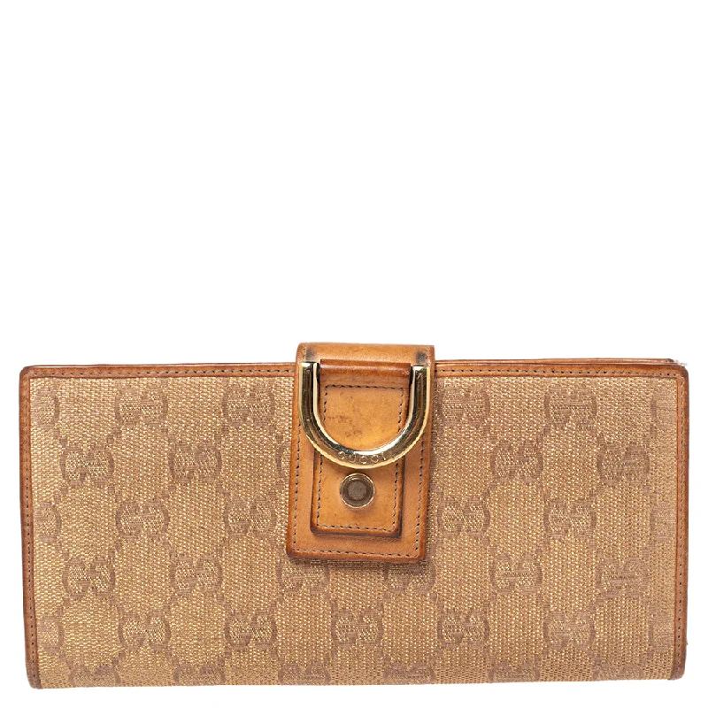 Women's money clip with a double - sided designGucci Metallic Beige Gg Canvas And Leather D Ring Continental Wallet.. Women's money clip with a double - sided designGucci Metallic Beige Gg Canvas And Leather D Ring Continental Wallet..