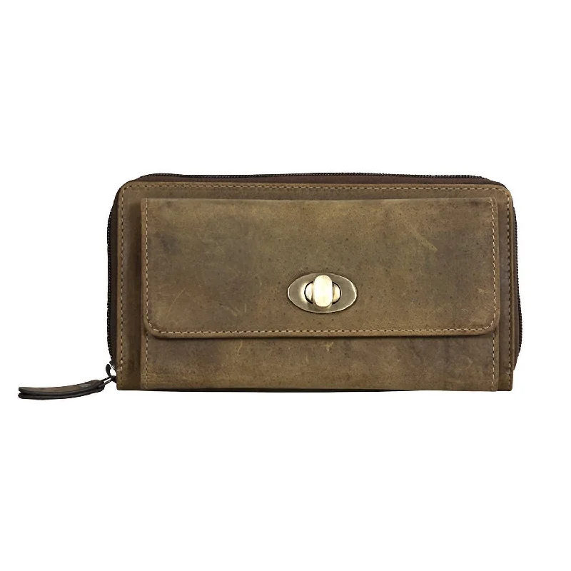 Women's money clip with a faux fur trim​Longhorn Canyon Wallet In Brown