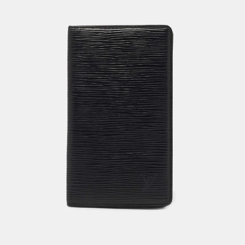 Women's money clip for a sporty - chic outfitLouis Vuitton Black Epi Leather Bifold Long Wallet.. Women's money clip for a sporty - chic outfitLouis Vuitton Black Epi Leather Bifold Long Wallet..