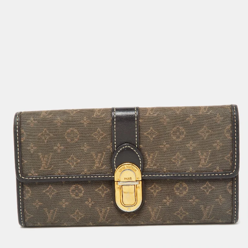 Women's money clip with a braided leather strap​Louis Vuitton Brown Monogram Idylle Canvas And Leather Sarah Wallet