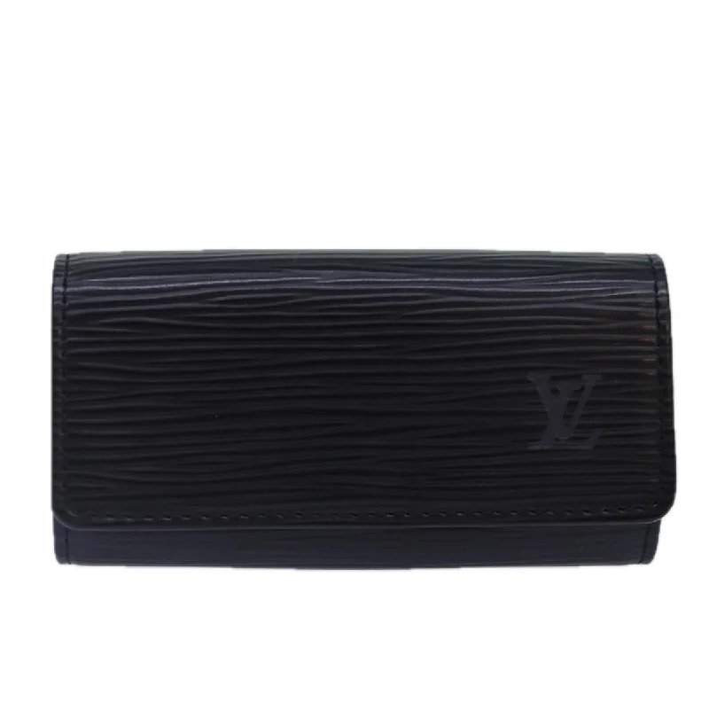 Women's money clip with a zodiac symbol design​Louis Vuitton Multiclés 4  Leather Wallet  (Pre-Owned)