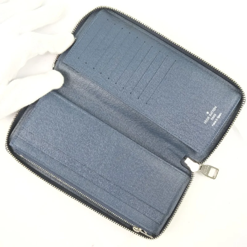 Lightweight money clips for travelLouis Vuitton Zippy Wallet Vertical  Leather Wallet  (Pre-Owned)