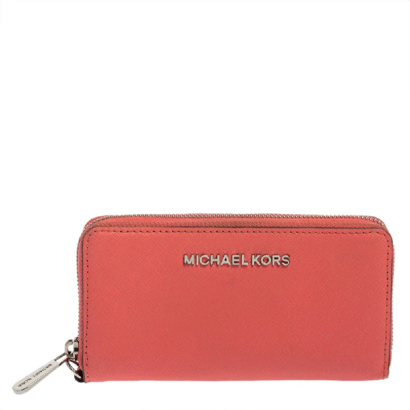 Women's money clip with a secret compartment​Michael Kors Pink Leather Zip Around Wristlet Wallet..