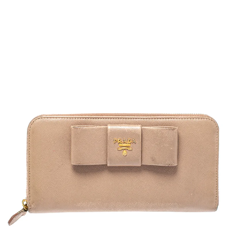 Women's money clip for a back - to - school accessoryPrada Beige Saffiano Leather Bow Zip Around Wallet.. Women's money clip for a back - to - school accessoryPrada Beige Saffiano Leather Bow Zip Around Wallet..