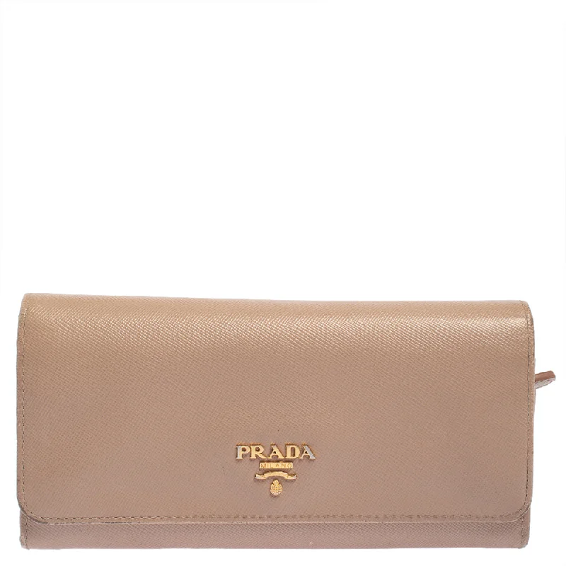 Women's money clip with a tassel for added flair​Prada Beige Saffiano Lux Leather Flap Continental Wallet..