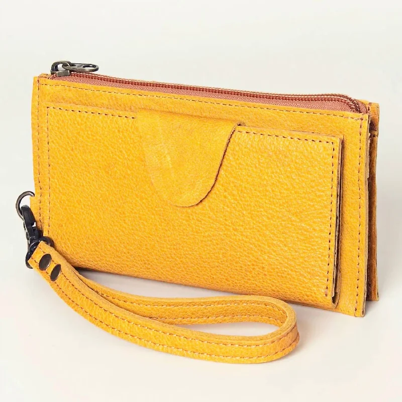 Women's money clip in gold - tone metal​Wristlet/wallet In Mustard