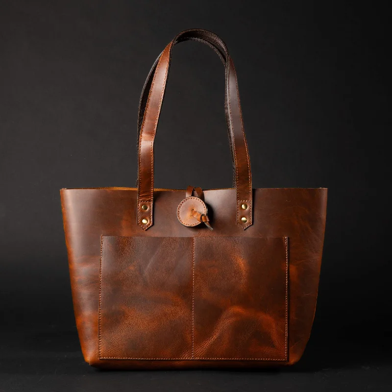 Metallic Tote Bag in Rose Gold with Chain Handles for a Glamorous Night OutTolredo - Cognac Leather Tote Bag with Leather Closure Metallic Tote Bag in Rose Gold with Chain Handles for a Glamorous Night OutTolredo - Cognac Leather Tote Bag with Leather Closure
