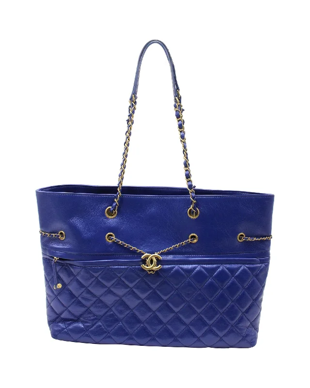 Faux Fur - Trimmed Tote Bag in White for a Cozy Winter LookChanel Front Zip Drawstring Shopping Tote Bag Large in Blue Quilted Calfskin Leather Faux Fur - Trimmed Tote Bag in White for a Cozy Winter LookChanel Front Zip Drawstring Shopping Tote Bag Large in Blue Quilted Calfskin Leather