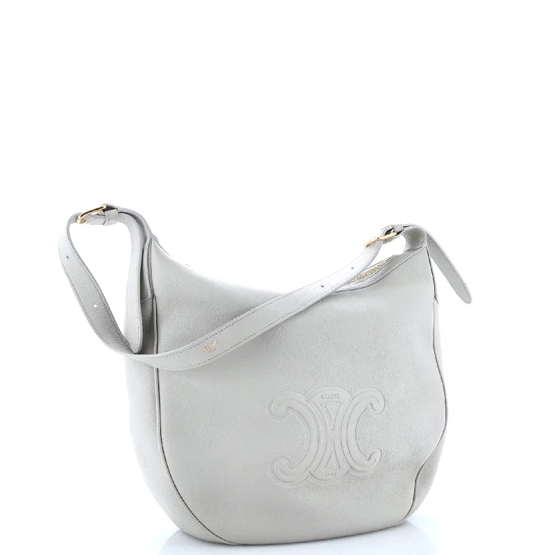 Metallic Shoulder Bag in Gold for Special OccasionsHeloise Shoulder Bag Triomphe Embossed Leather Metallic Shoulder Bag in Gold for Special OccasionsHeloise Shoulder Bag Triomphe Embossed Leather