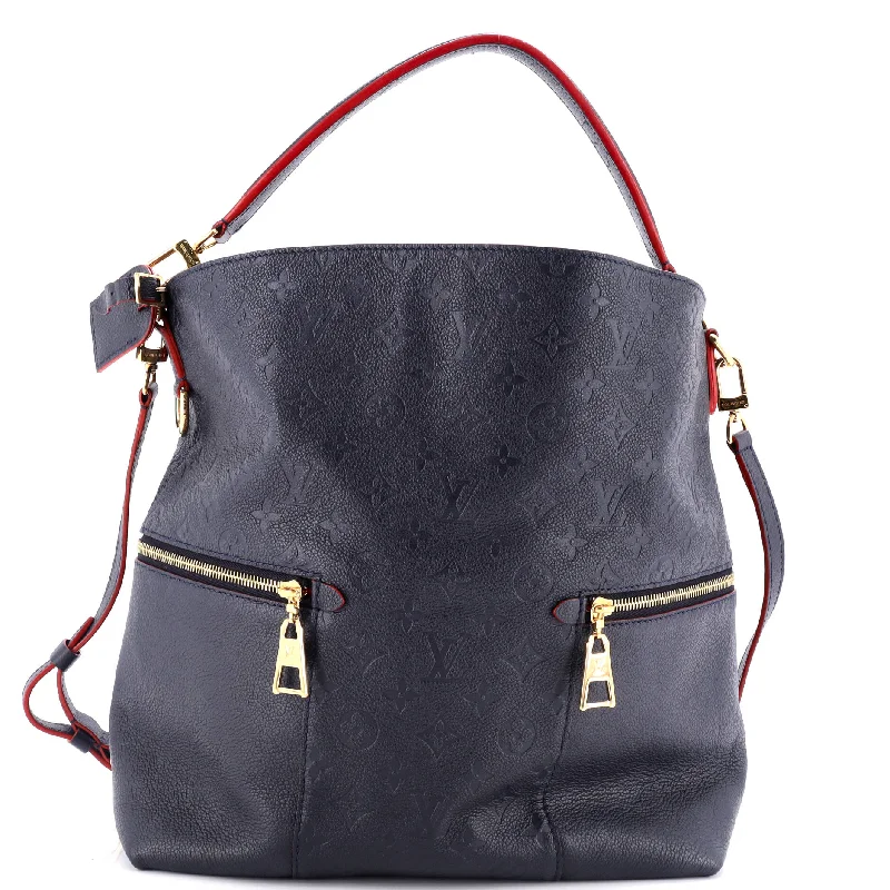 Canvas and Leather Combo Shoulder Bag in Tan for a Rustic LookMelie Handbag Monogram Empreinte Leather Canvas and Leather Combo Shoulder Bag in Tan for a Rustic LookMelie Handbag Monogram Empreinte Leather