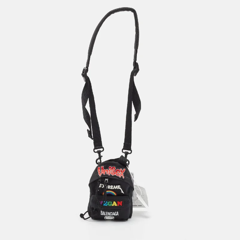 Metallic Crossbody Bag in Silver for New Year's Eve and Special CelebrationsBalenciaga Black Nylon Mini Gamer Patch Backpack Crossbody Bag..