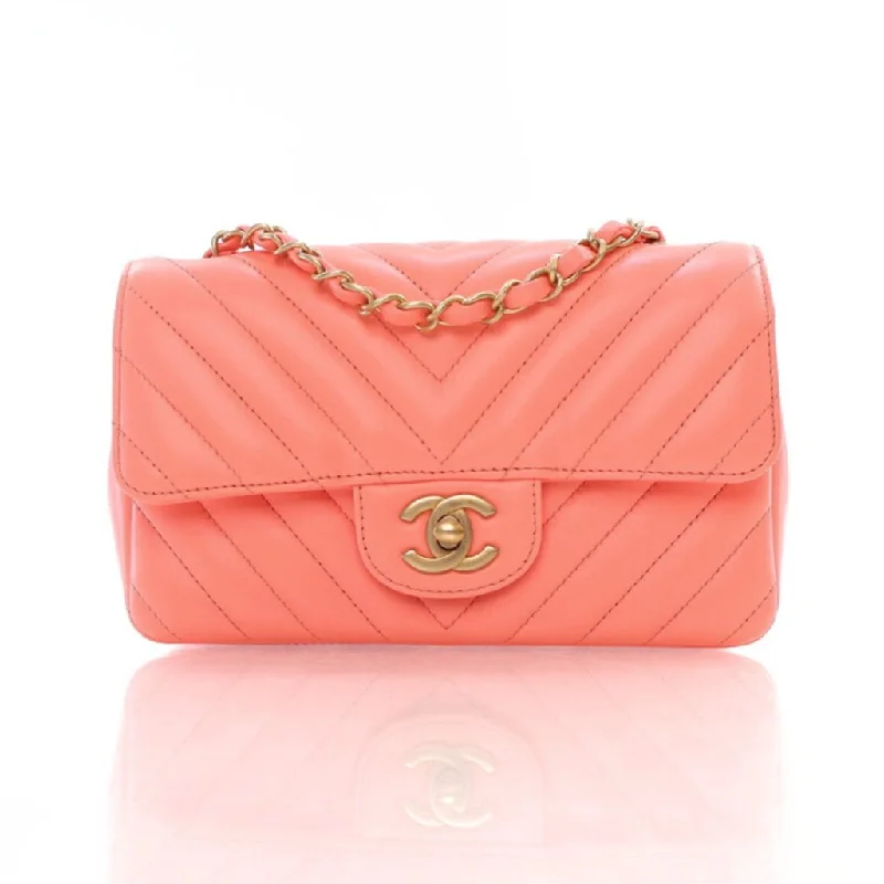 Medium - sized Canvas Crossbody Bag in Beige with Floral Print for Spring OutingsChanel Chevron Mini Rectangle Pink Lambskin Medium - sized Canvas Crossbody Bag in Beige with Floral Print for Spring OutingsChanel Chevron Mini Rectangle Pink Lambskin