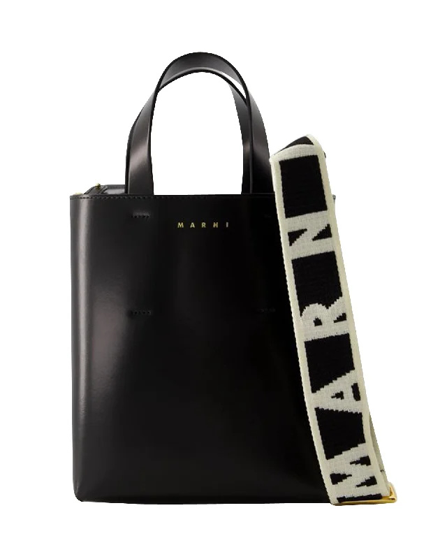 Leather - Trimmed Denim Crossbody Bag in Blue for a Vintage - Inspired LookMuseo Mini Crossbody - Marni - Leather - Black Leather - Trimmed Denim Crossbody Bag in Blue for a Vintage - Inspired LookMuseo Mini Crossbody - Marni - Leather - Black