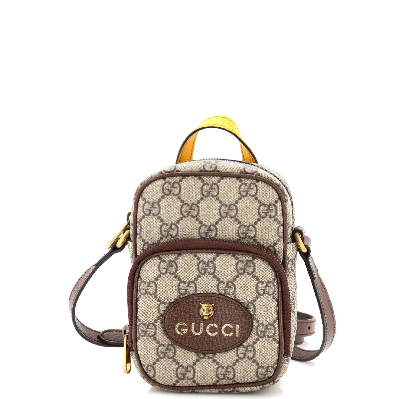 Metallic Crossbody Bag in Silver for New Year's Eve and Special CelebrationsNeo Vintage Top Handle Crossbody Bag GG Coated Canvas Mini