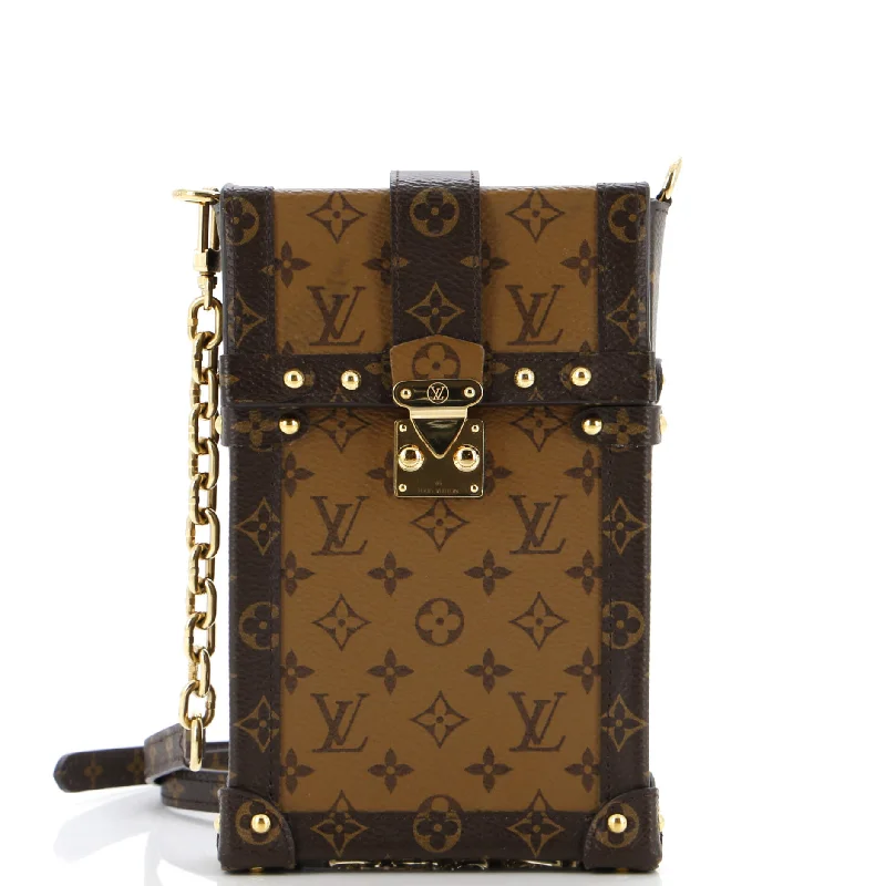 Leather - Trimmed Denim Crossbody Bag in Blue for a Vintage - Inspired LookVertical Trunk Pochette Reverse Monogram Canvas Leather - Trimmed Denim Crossbody Bag in Blue for a Vintage - Inspired LookVertical Trunk Pochette Reverse Monogram Canvas